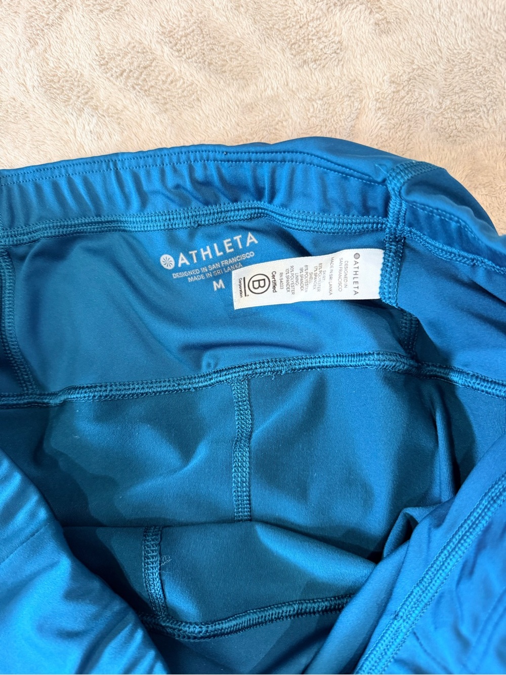 Athleta Sporty Teal Blue Tennis Tiered Athletic Skirt w Shorts Size Medium - Picture 3 of 6